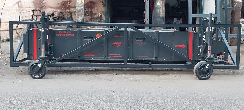 Neometrix CM Transportation Module A3076 — wheeled trolley loaded with canisterised missiles marked Rocket With Bursting Charge, as manufactured