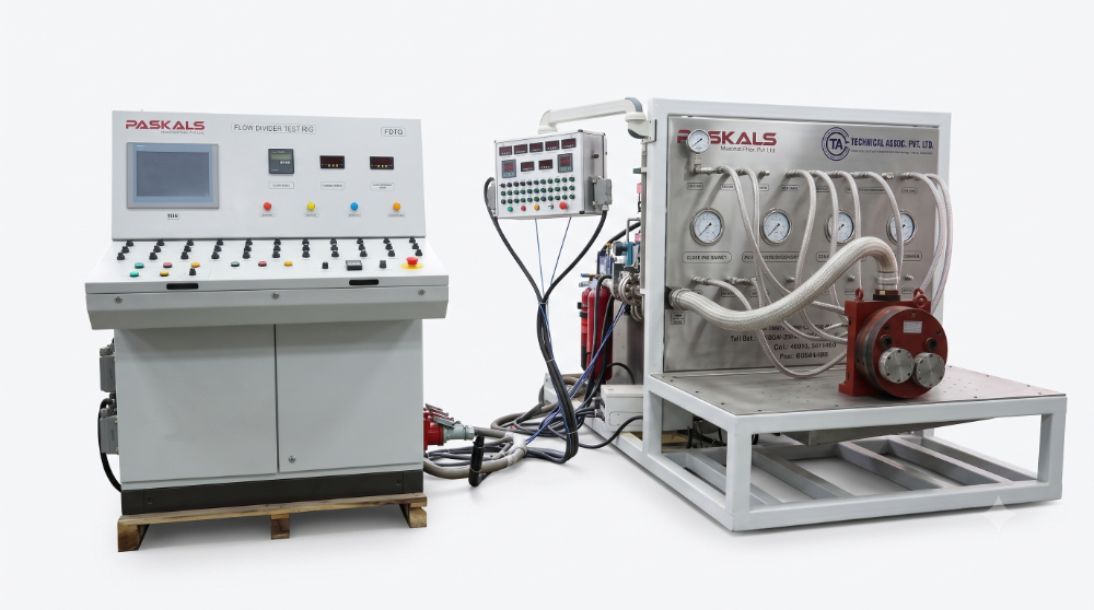 Multi-port flow divider test bench — operator control console cabinet and instrumented gauge skid with red flow divider under test