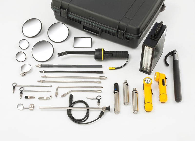 Visual Search Kit inspection tools laid out - optical inspection mirrors, probes, white and UV illuminators and cabled tool by Neometrix