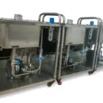 Stainless steel hydraulic test pac units on castor-mounted trolley frames