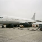 Aircraft lifted on pneumatic air-lifting bags and jacks during a recovery
